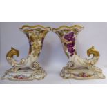 A pair of late Victorian china cornucopia vases with birds' heads,