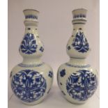 A pair of 19thC Chinese double gourd shaped porcelain vases,