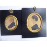 Two similar mid 19thC oval head and shoulders profile portrait miniatures,