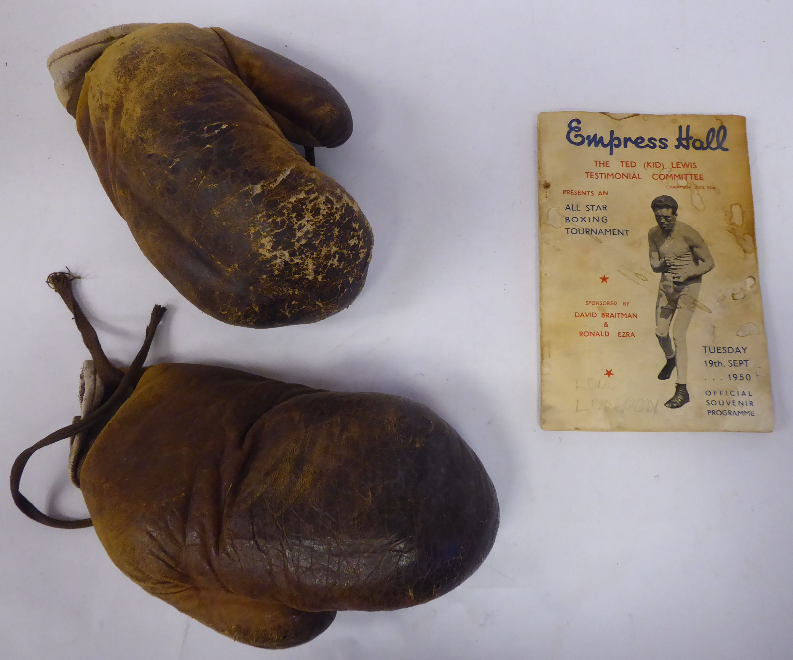 A pair of 'vintage' boxing gloves and an 'Empress Hall' (Lillie Road SW6) McTed (kid) Lewis