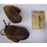 A pair of 'vintage' boxing gloves and an 'Empress Hall' (Lillie Road SW6) McTed (kid) Lewis