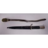 A German military dress bayonet with a ribbed handgrip, the blade bears an ACS Alsco,