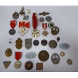 German Third Reich related and associated badges and tokens: to include an enamelled gilt metal