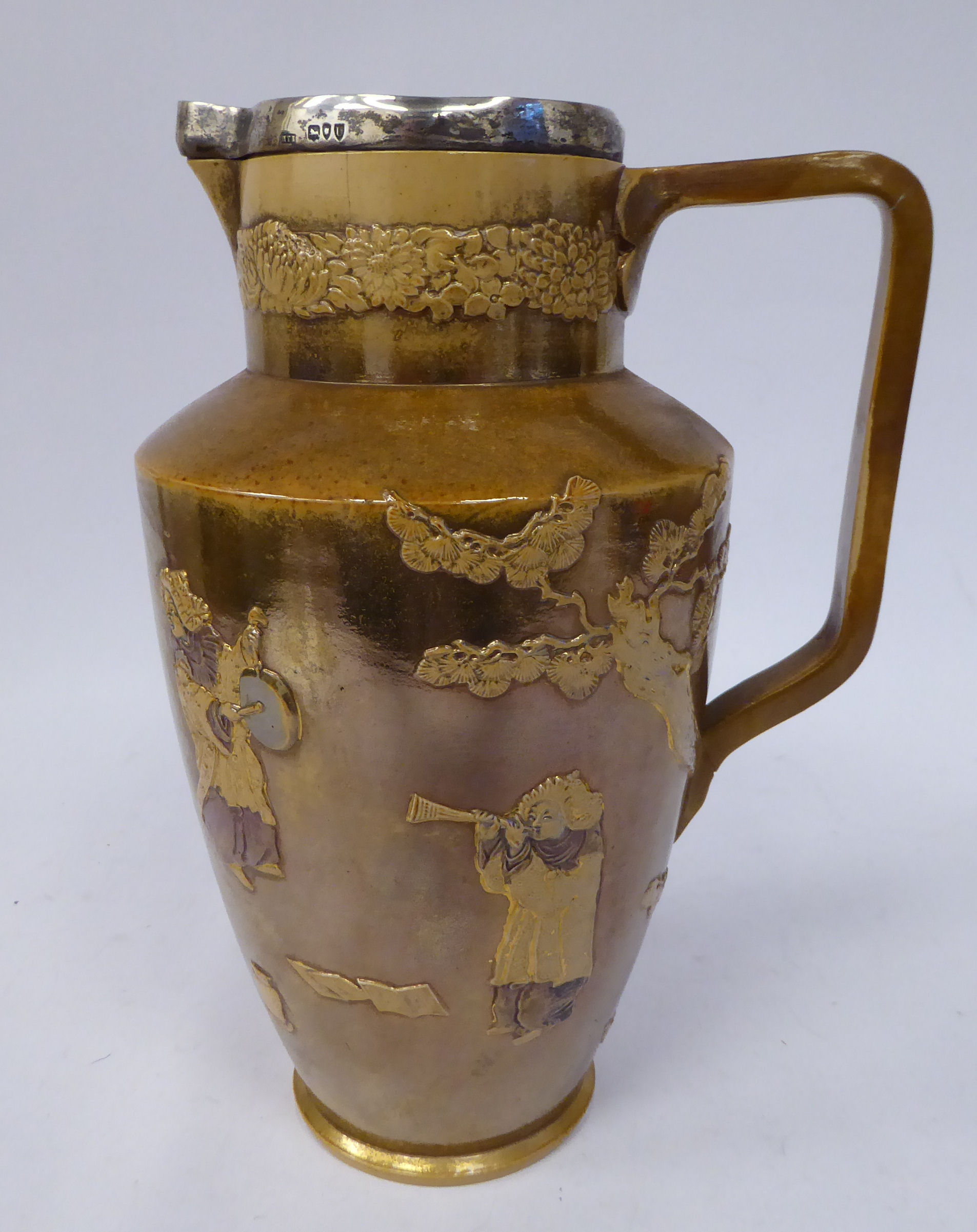A late Victorian Doulton Lambeth gilded, lustre glazed stoneware jug of tapered form,