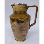 A late Victorian Doulton Lambeth gilded, lustre glazed stoneware jug of tapered form,