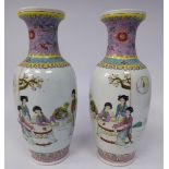 A pair of early 20thC Chinese porcelain baluster shaped vases with narrow necks and flared cup rims,