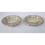 A pair of late Victorian silver oval sweet dishes with flared rims,