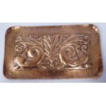 An early 20thC spot-hammered and embossed copper tray, depicting a pair of small,