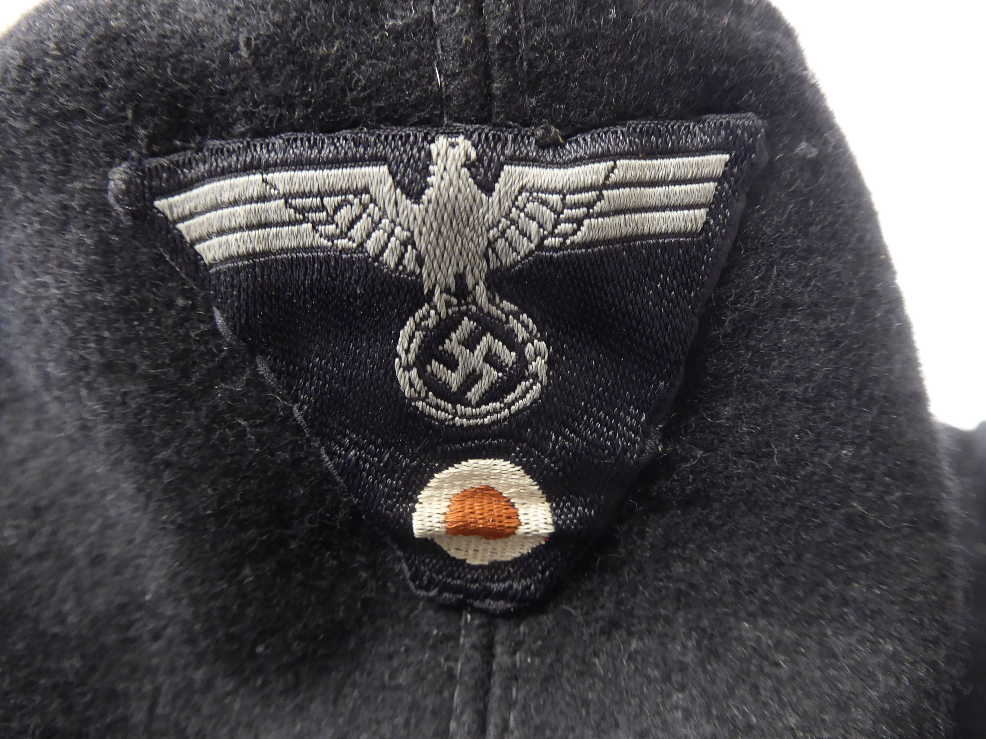 A German army black ski cap with a woven spreadeagle and swastika emblem (Please Note: this lot is - Image 6 of 7