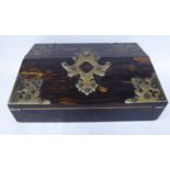 A late Victorian coromandel veneered and rivetted, decoratively cut,