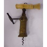 A late 19thC brass steel King's Screw, London rack type corkscrew with a wire helix,