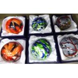 Six glass paperweights various colours & designs boxed OS10