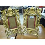 A pair of mid 20thC French lacquered brass photograph frames,