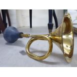 A modern reproduction of a lacquered brass motor horn BSR