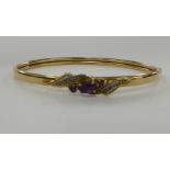 A 9ct gold bangle,