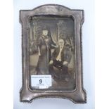 An early 20thC silver mounted photograph frame, on a fabric covered easel stand Birmingham 1911 3.