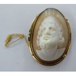 A cameo brooch, featuring a male portrait,