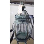 A modern green painted metal garden candle lantern of hexagonal form 17''h BSR