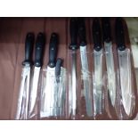 A Waltmann & Sohn nine piece set of kitchen knives,