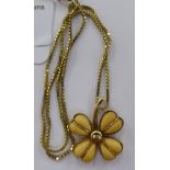 A 14ct gold shamrock pendant, on a fine yellow metal,