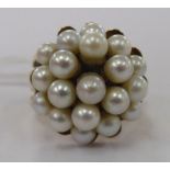 A 14ct gold pearl set cluster ring 11