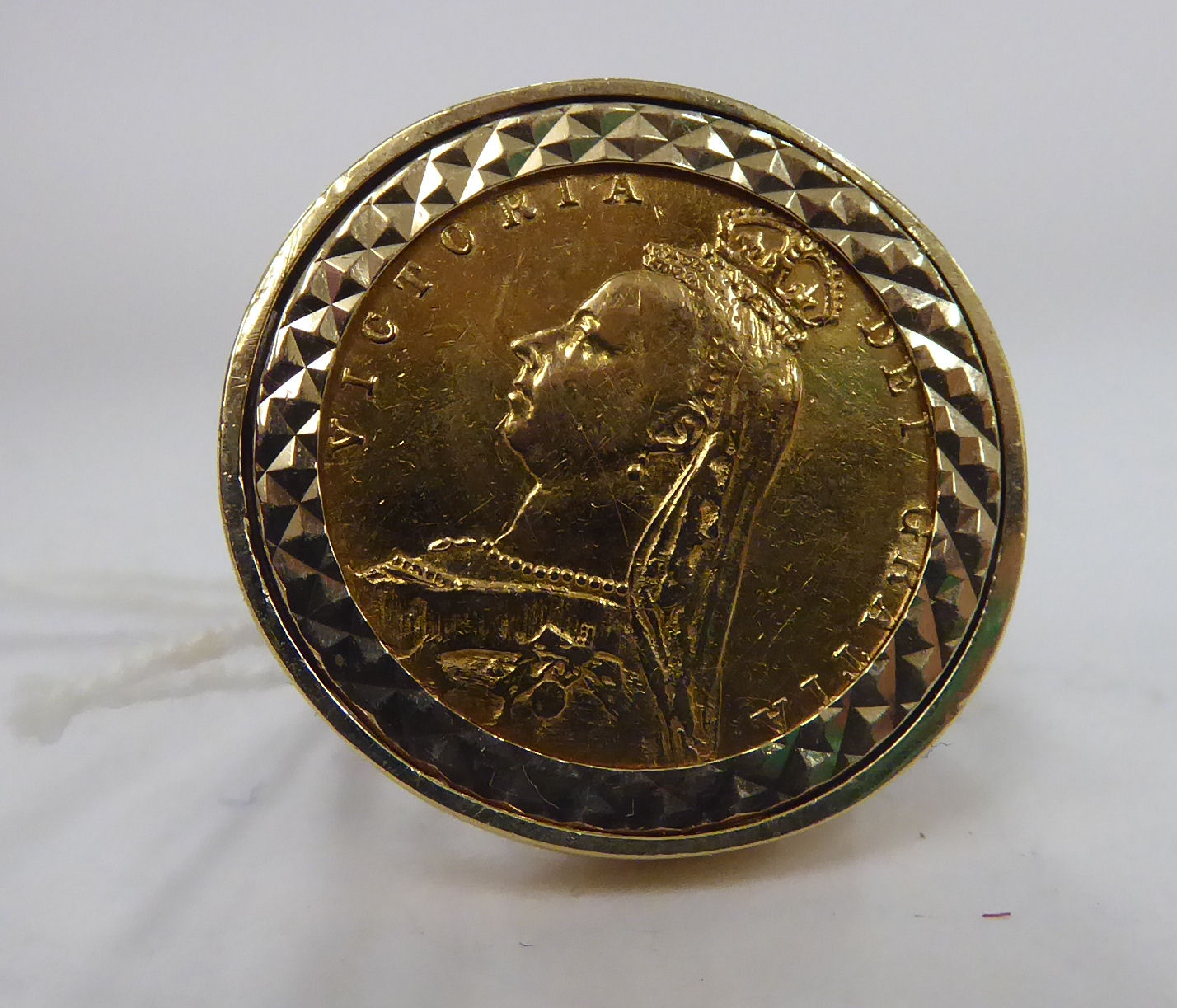 A Victorian half-sovereign ring, a crowned Royal Standard on the obverse,