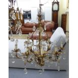 A mid 20thC rococo design gilt metal, eight branch,