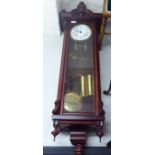 A modern Kieninger mahogany cased Vienna regulator;