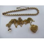 Gold coloured metal items of personal ornament: to include a roll link bracelet;