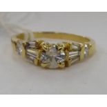 An 18ct gold diamond solitaire,