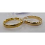 A 14ct gold and an identical 22ct gold wedding ring 11