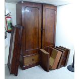 A late Victorian mahogany wardrobe with a moulded cornice,