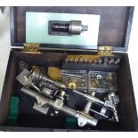 A watchmaker's lathe with accessories T0S8