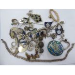 Silver coloured and white metal items of personal ornament: to include a heart shaped pendant;