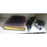 A mixed lot: to include a late Victorian brown hide clad photograph album OS9