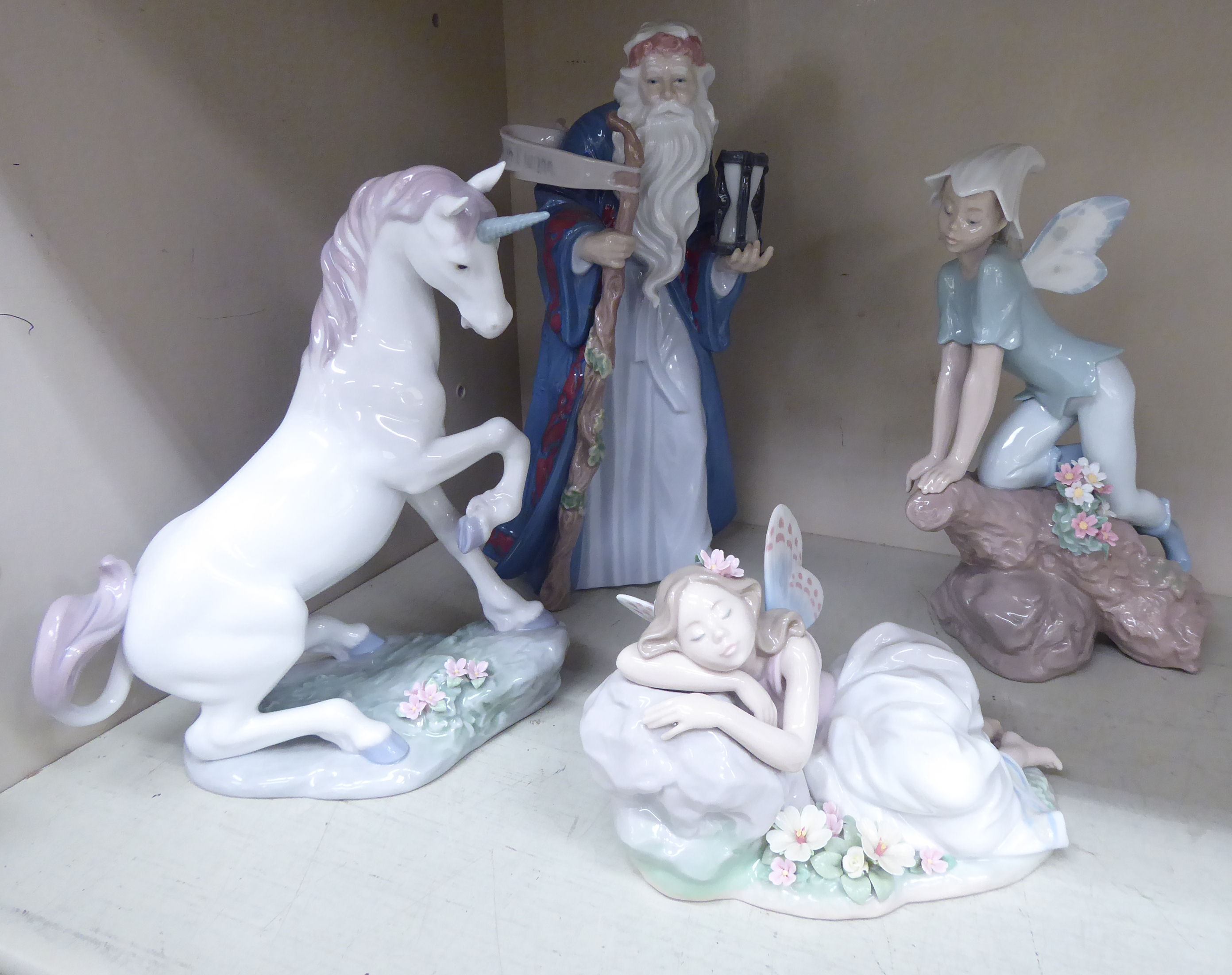 Four Lladro porcelain fantasy themed figures: to include a Unicorn 8.
