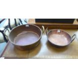 Two late 19thC copper preserve pans with opposing rivetted handles 12'' & 17''dia RAM