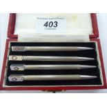 A set of four silver bridge pencils,