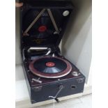 A 1930s Columbia portable gramophone with a folding handle,