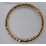 A 9ct gold bangle 11