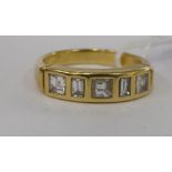 A yellow metal five stone rubover set diamond ring 11