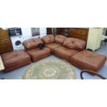 A modern tubular steel framed and cushioned, tan coloured faux hide,