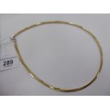 A modern 14ct bi-coloured gold flexible link necklet,