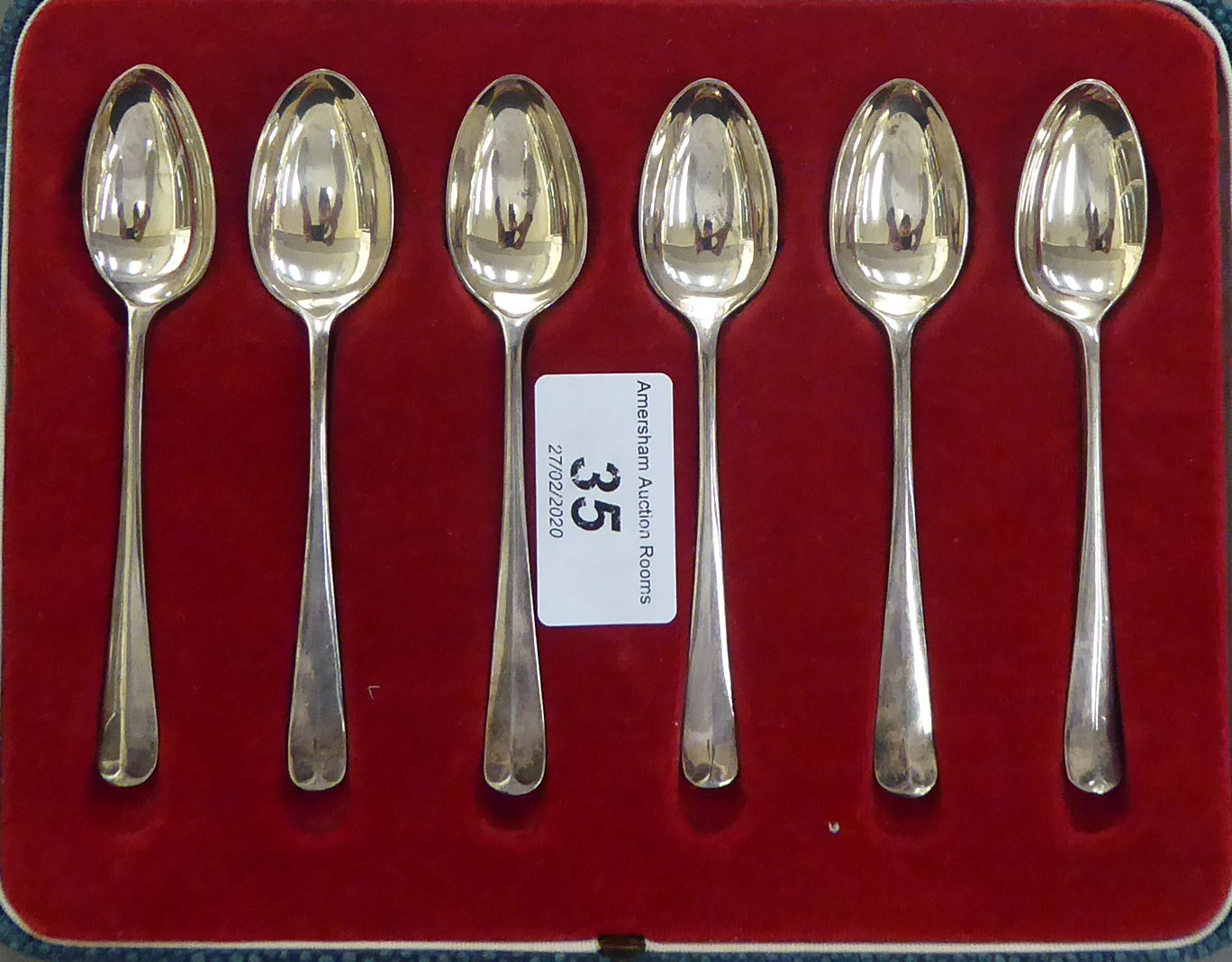 A set of six silver 1935 Jubilee teaspoons 'British Hall Marks' cased OS10