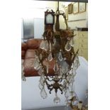 A mid 20thC Louis XV design gilt metal centre light fitting with cut glass drops 27''h SR