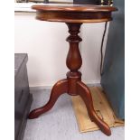 A Victorian style mahogany pedestal table, the vase shaped column raised on a splayed,