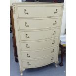A mid 20thC Boffi Furniture Continental style cream painted and part gilded bow front tallboy,