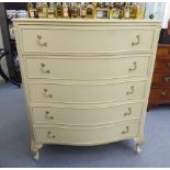 A mid 20thC Boffi Furniture Continental style cream painted and part gilded bow front dressing