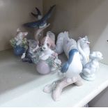 Eight Lladro porcelain model animals: to include a pair of swans 4.