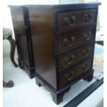 A pair of modern string inlaid mahogany finished four drawer beside chests,